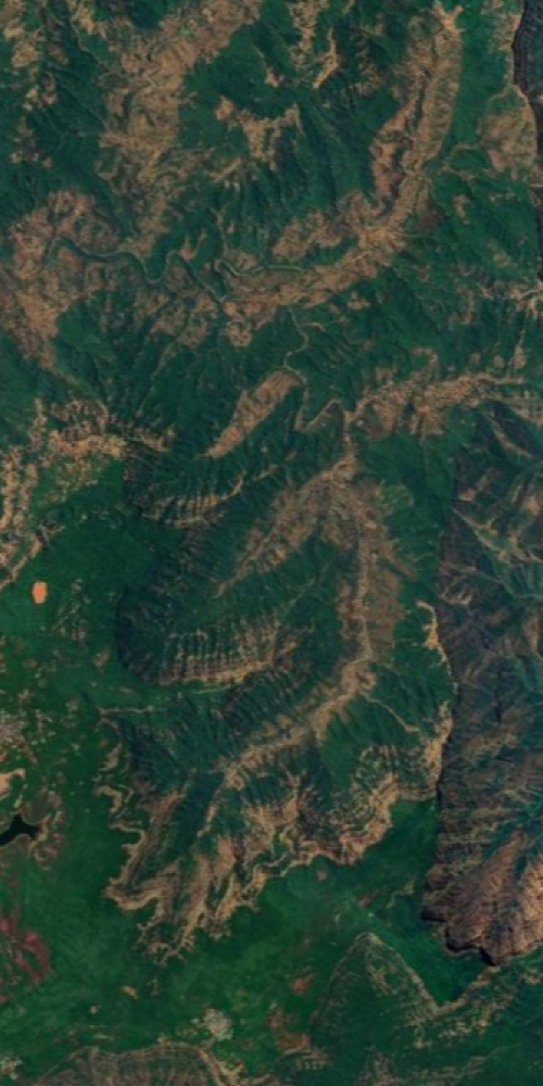 Satellite view of a place in India shaped like the letter G