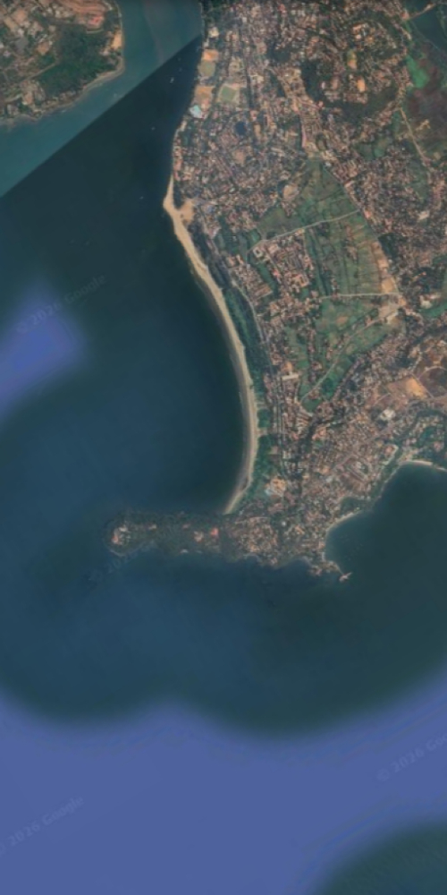Satellite view of a place in India shaped like the letter J