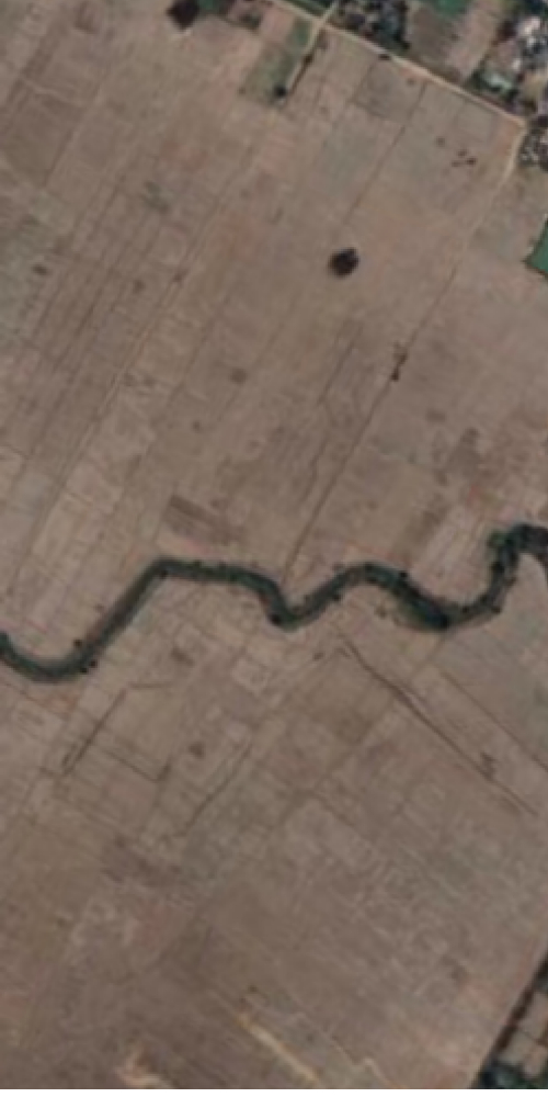 Satellite view of a place in India shaped like the letter M