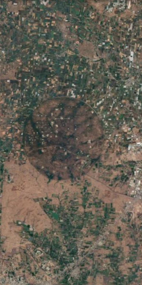 Satellite view of a place in India shaped like the letter O